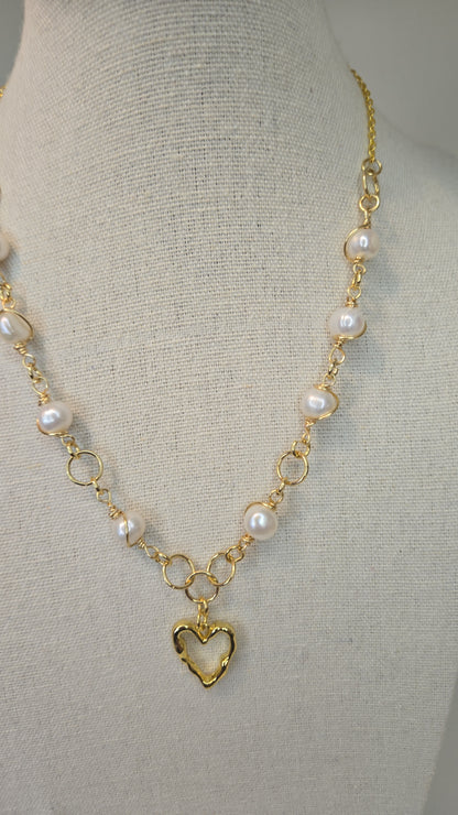 Open Heart Pearl Necklace with hand-wrapped white pearls and a gold-tone open heart pendant