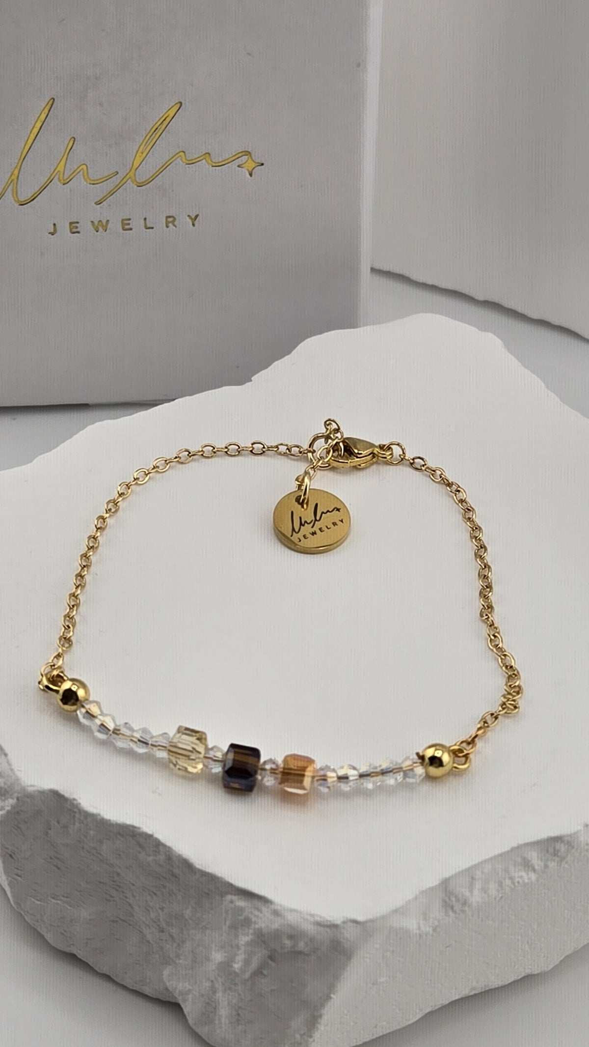 Champagne Trio Crystal Bracelet, crystal bicone beads and champagne, smoky brown and amber glass cubes on a gold-plated chain