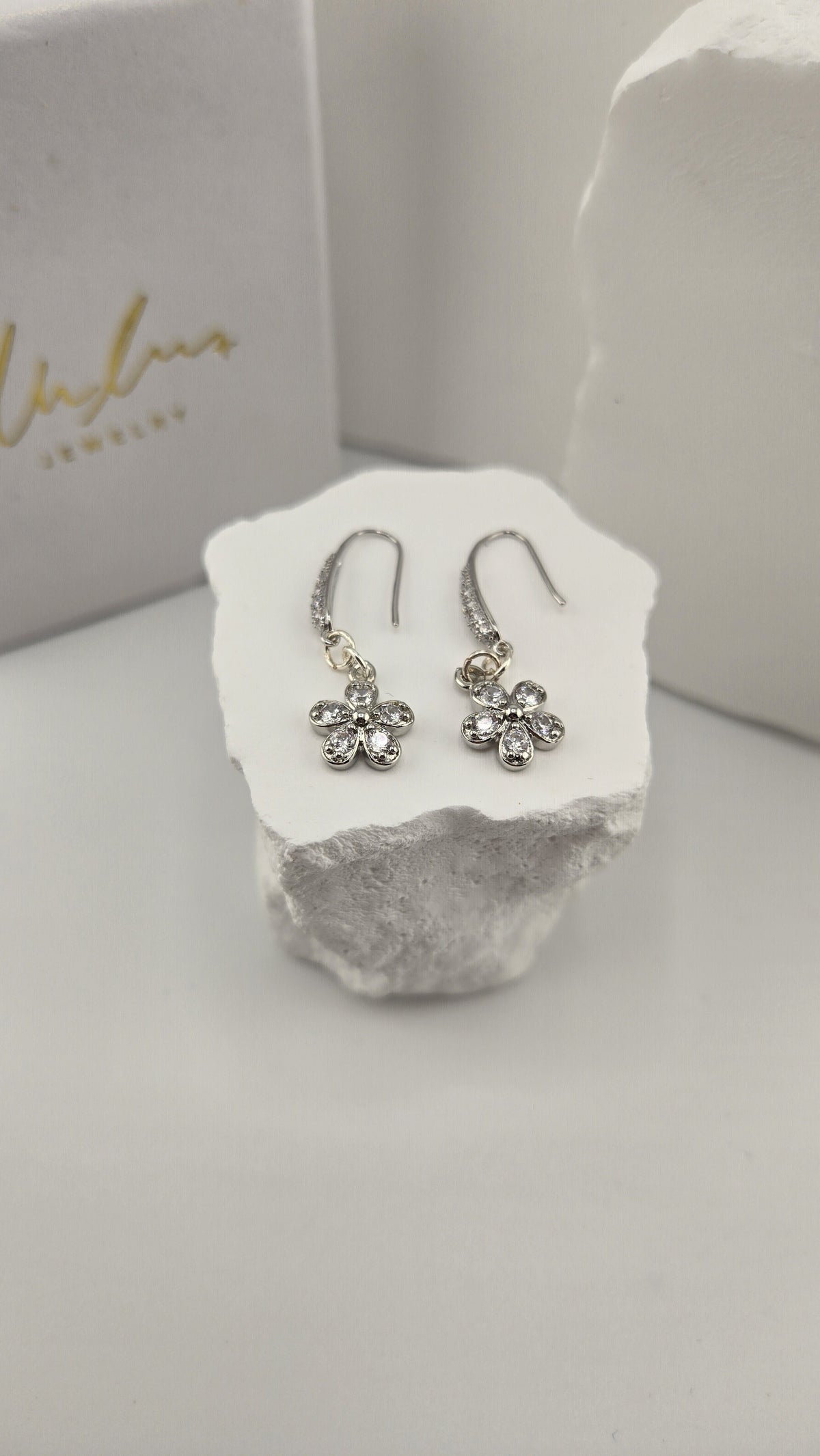Edelweiss Pavé Earrings, platinum-plated flower charms with sparkling stones