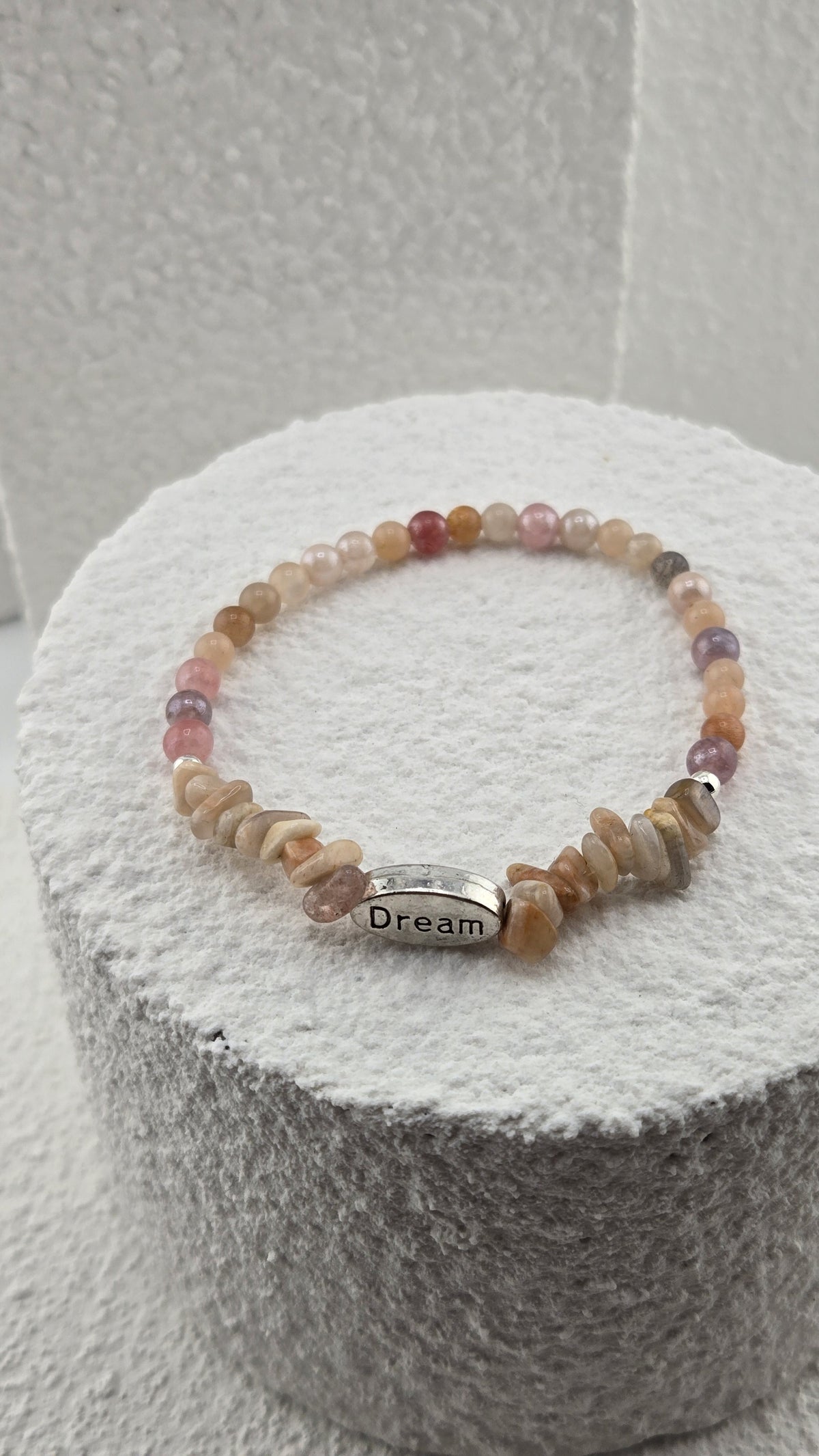 Dune Wish Bracelet showing round beads in peach, pink and lilac tones