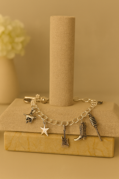 Rockstar Charm Bracelet in silver with star, guitar and cowboy boot pendants