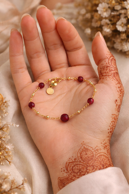 Ruby Chain Glow Bracelet with ruby-red crystal beads on a gold-tone chain, view 3