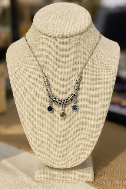 Drops of Dawn Blue Accent Necklace with blue-green drops on an ornate silver-tone chain, view 2