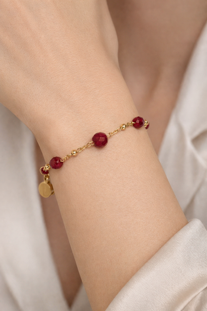 Ruby Chain Glow Bracelet with ruby-red crystal beads on a gold-tone chain, view 5