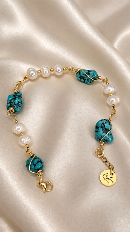 Ocean Pearl Bracelet with turquoise stones, freshwater pearls and gold-tone accents