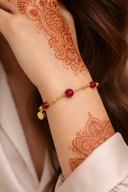 Ruby Chain Glow Bracelet with ruby-red crystal beads on a gold-tone chain, view 2