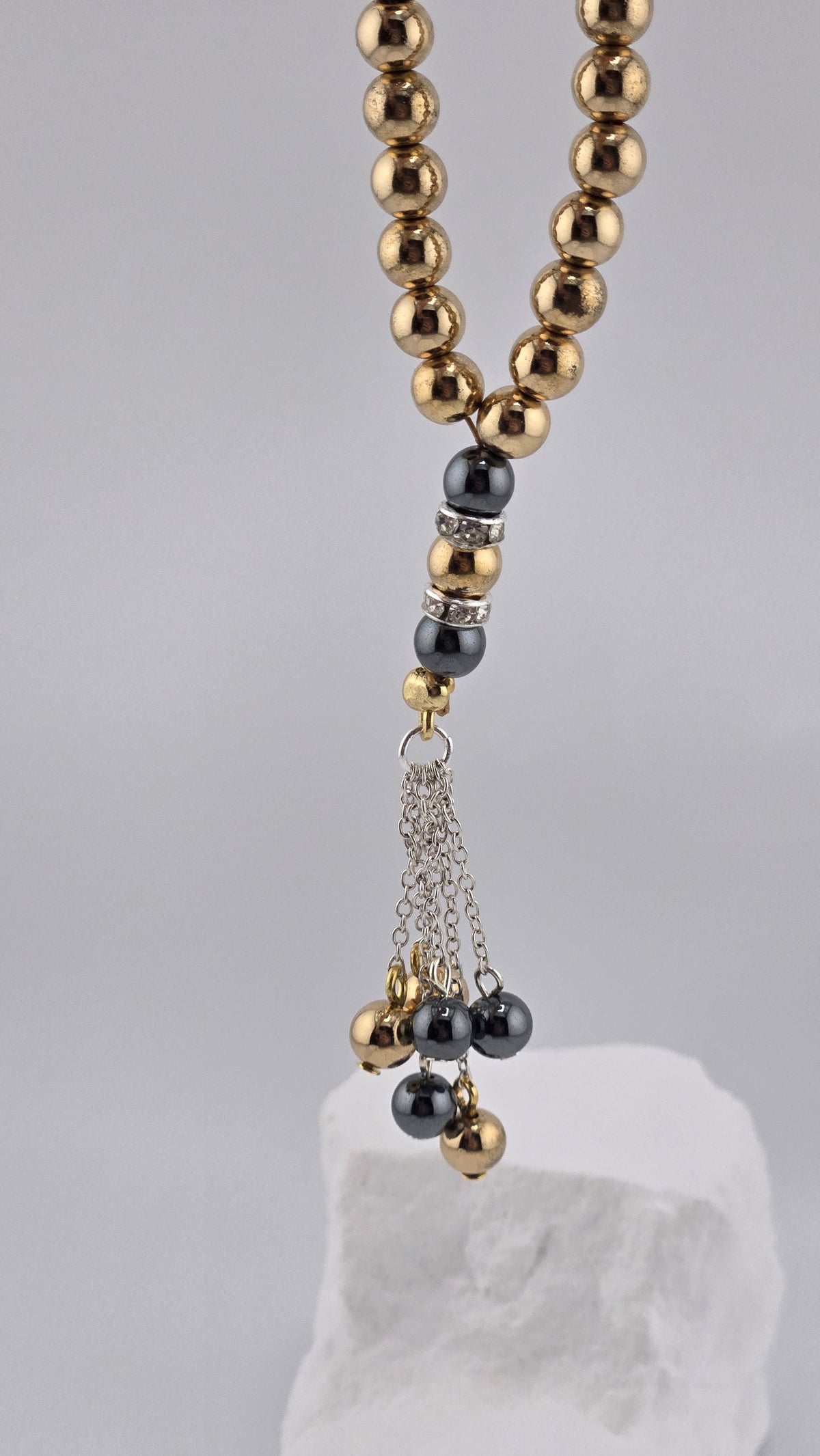 Silver-tone chain tassel with hematite drops
