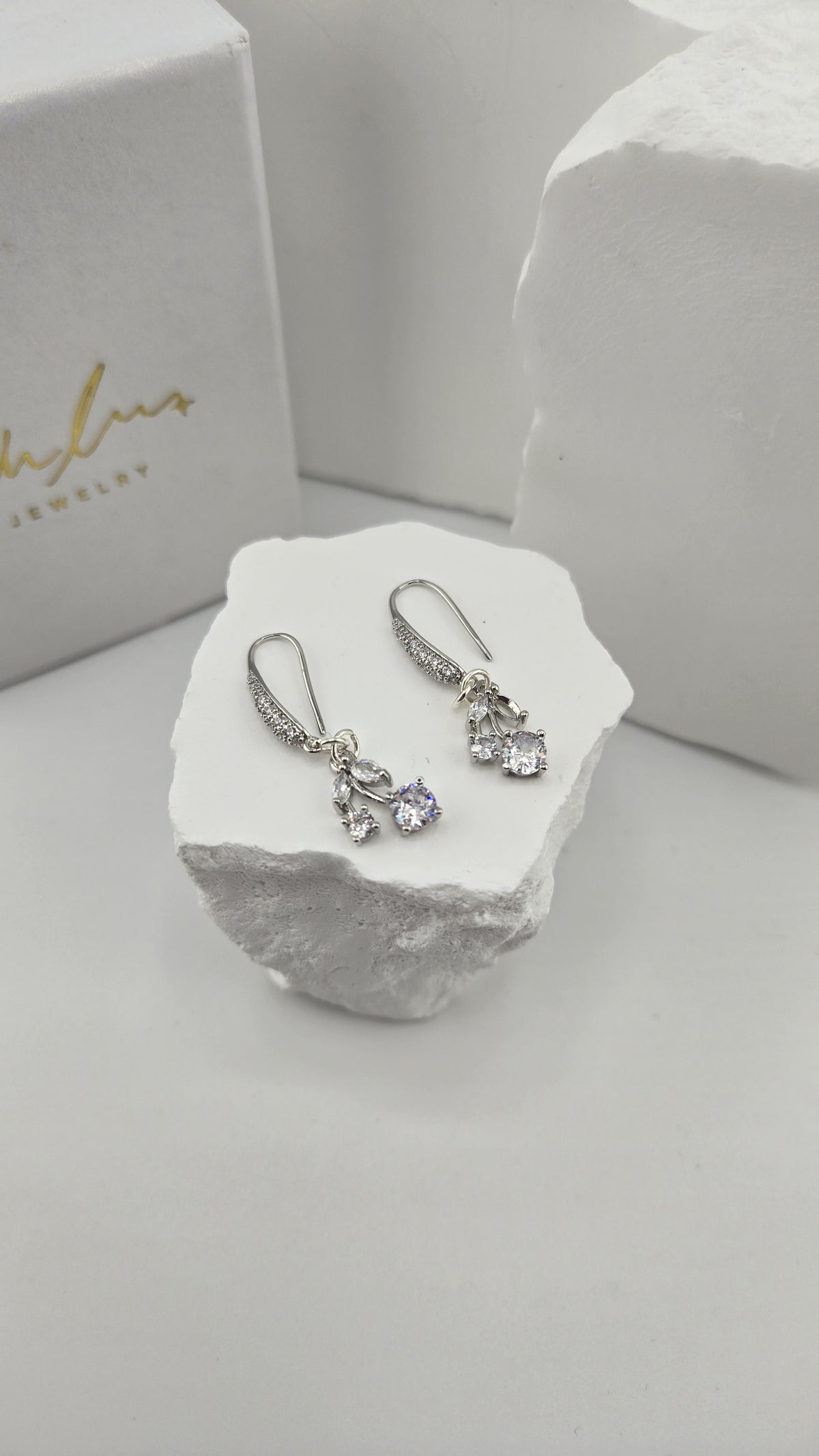 Glimmer Drop Earrings with cubic zirconia cherry charms on white stone