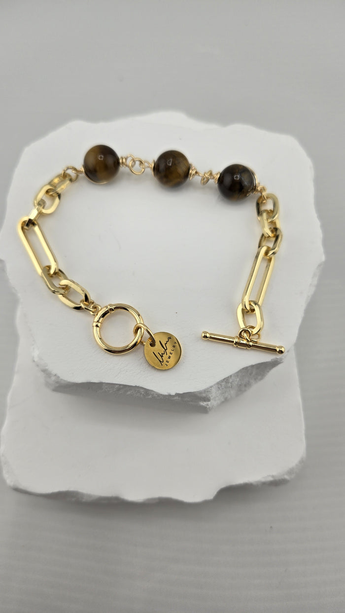 Hazel Paperclip Bracelet with three golden-brown beads on a gold-plated paperclip chain