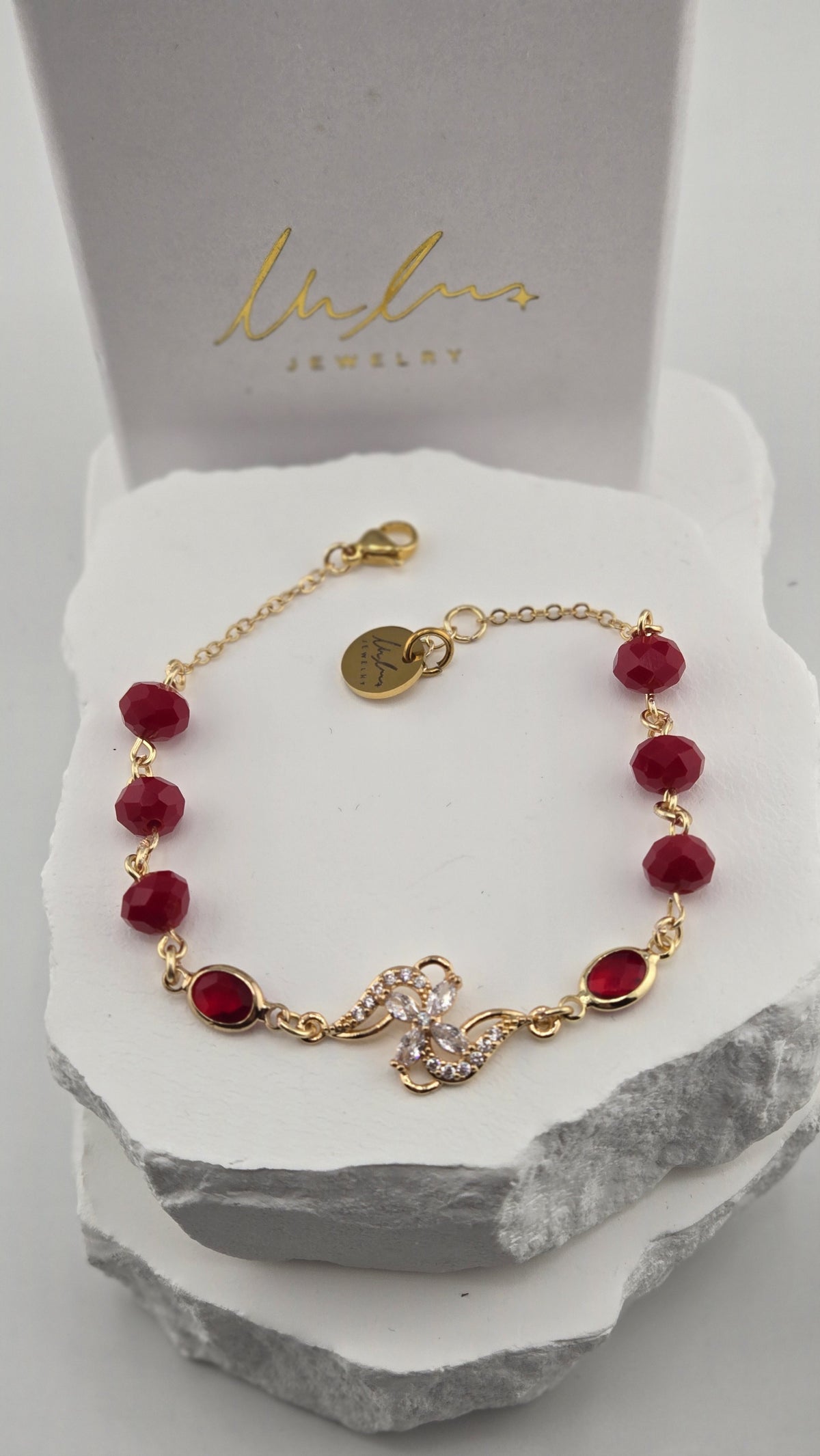 Hibiscus Pinwheel Bracelet front view on white stone