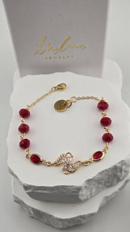 Hibiscus Pinwheel Bracelet front view on white stone