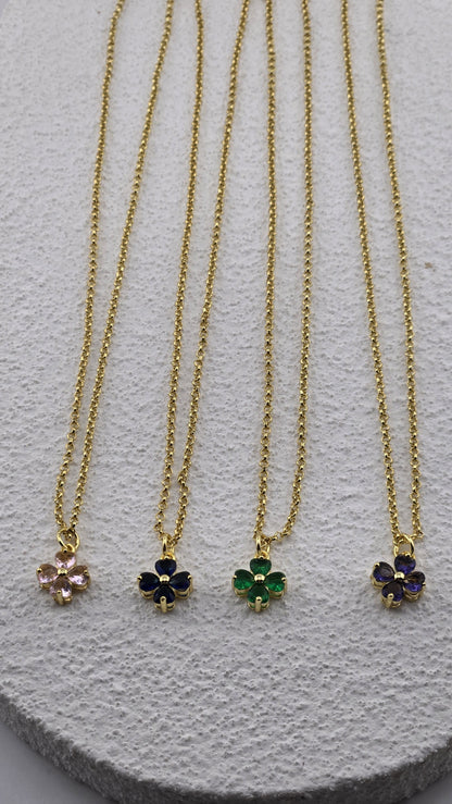 Meadow Clover Necklace in pink, navy, green and purple, four-leaf clover pendants with heart-shaped stones on gold-plated chains