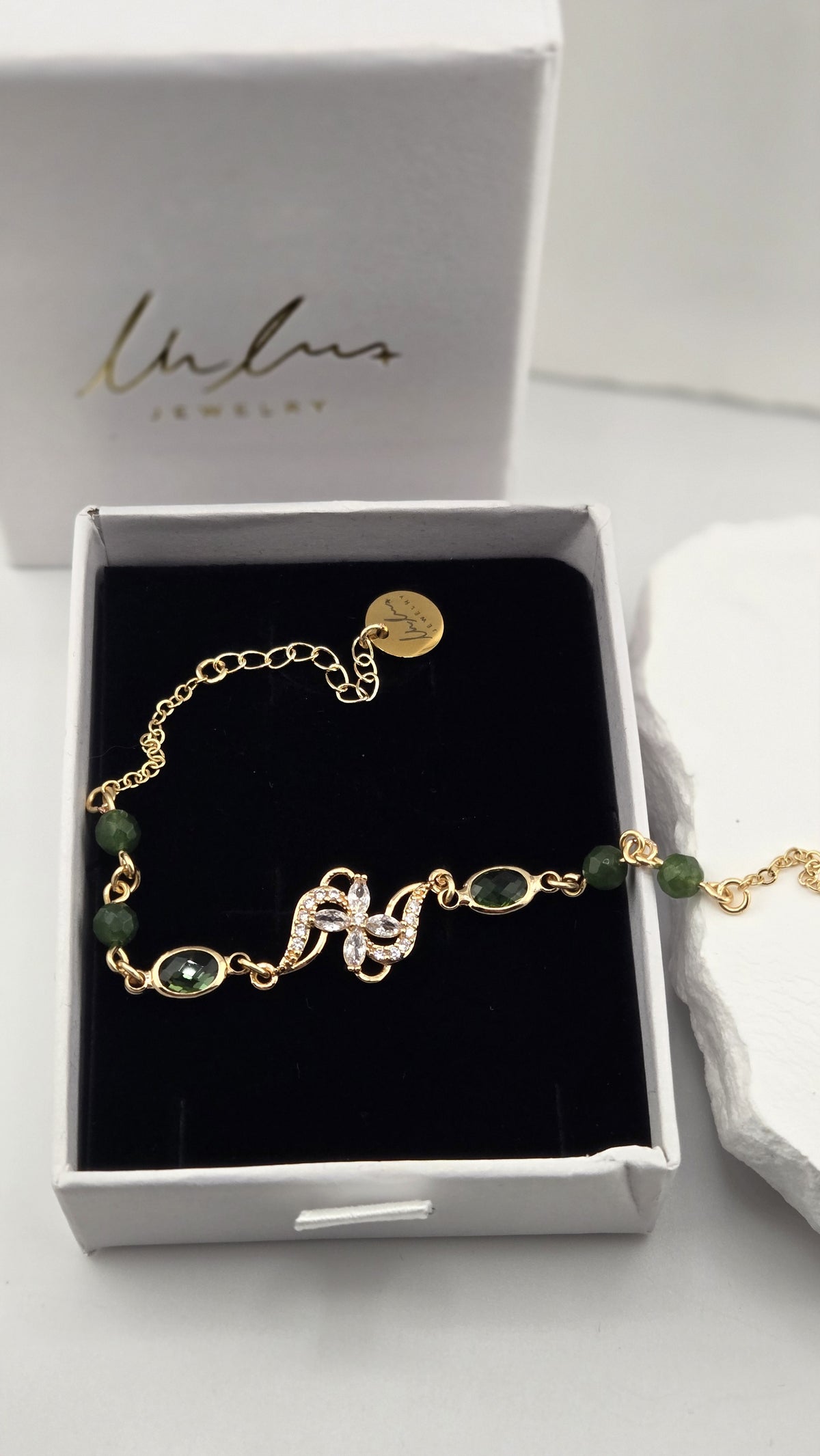 Olive Swirl Bracelet in an open gift box