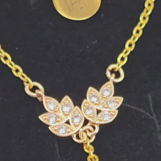 Video of the Golden Laurel Hand Chain in its LuluTouch gift box