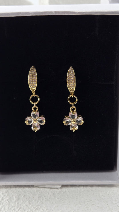Quatrefoil Drop Earrings, clear four-leaf charms with heart-shaped stones under slim gold-plated pavé tops
