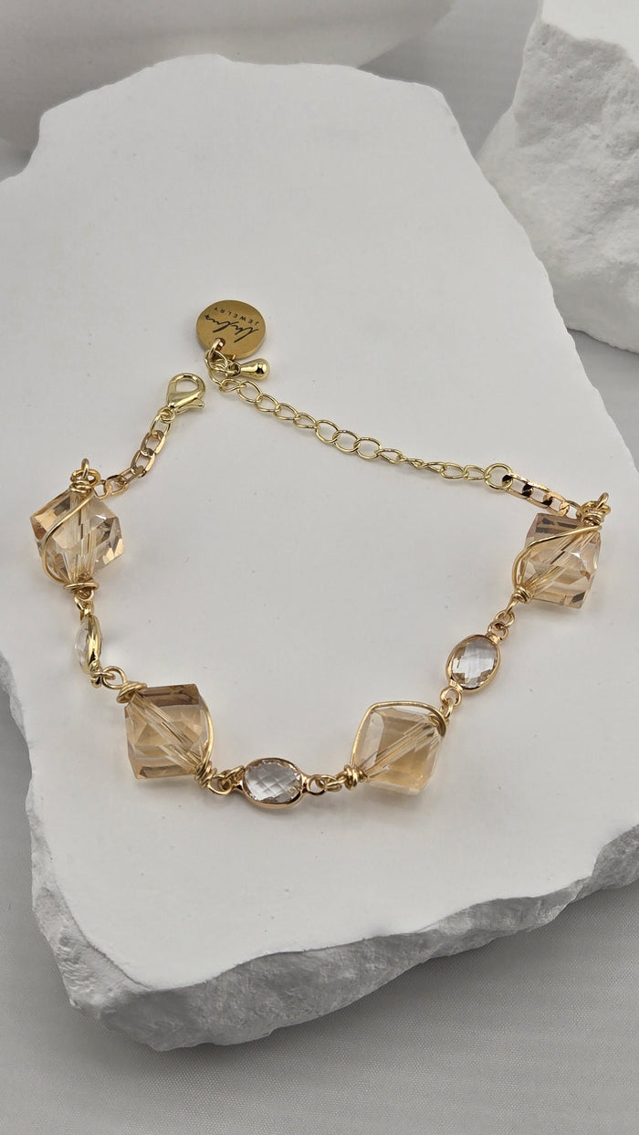 Sunlit Cube Bracelet with wire-wrapped champagne cubes and clear oval stones