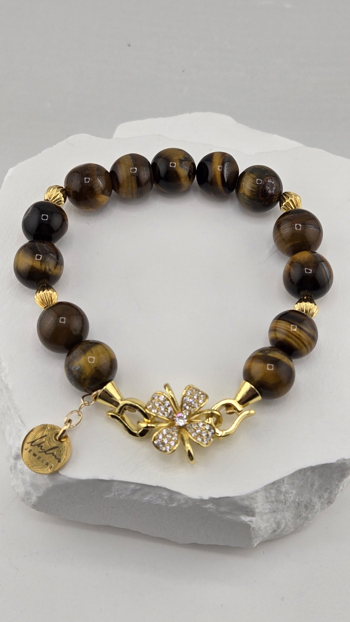 Round tiger's eye beads with gold-plated fluted spacers