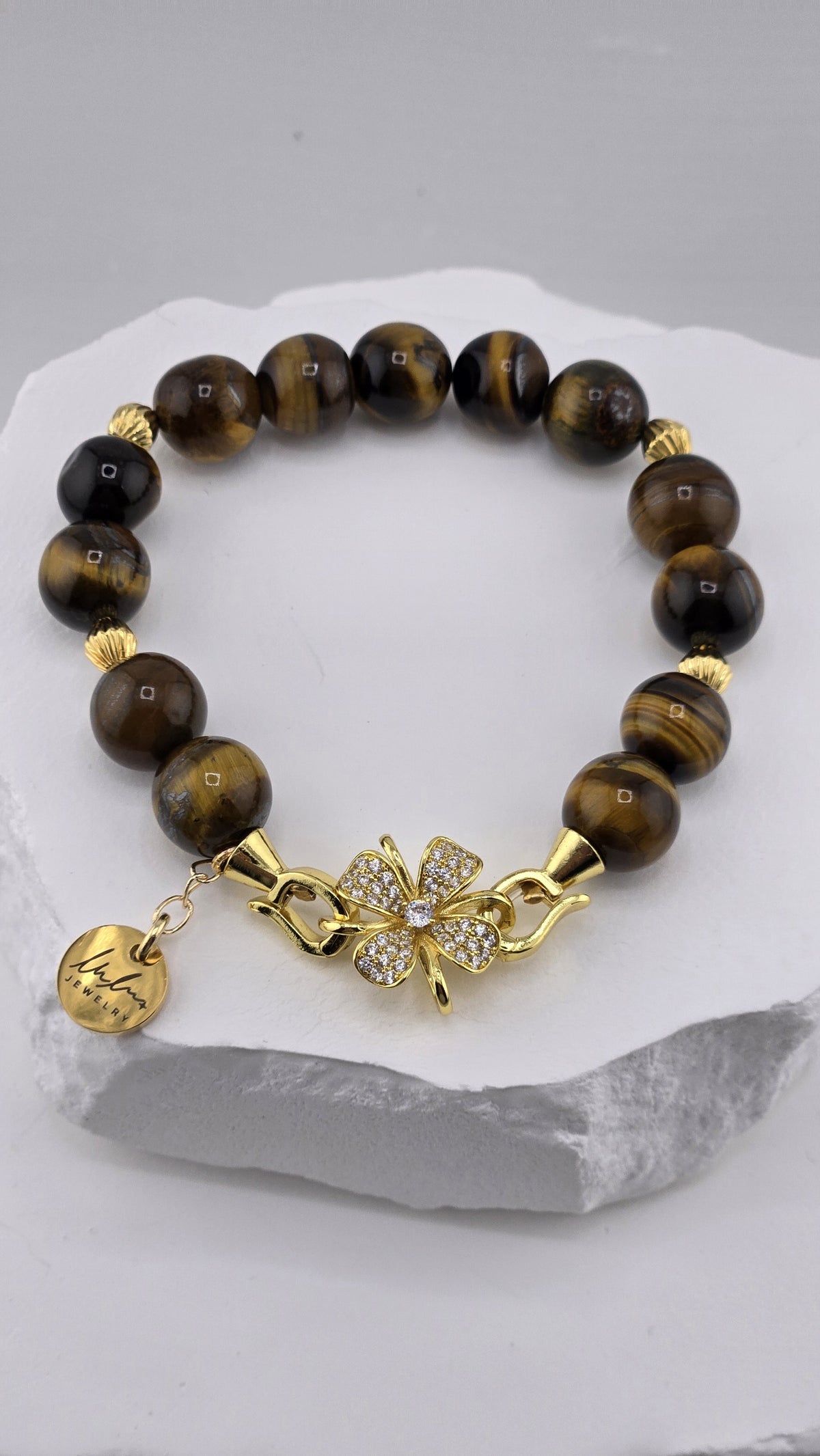 Tawny Flower Tiger's Eye Bracelet with gold flower clasp, front view